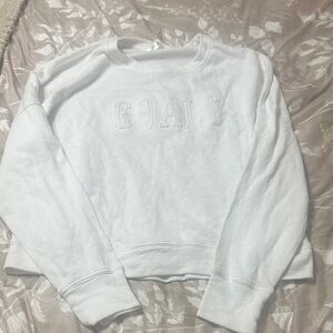 Fabletics White Sweatshirt with Embossed 'GOALS'